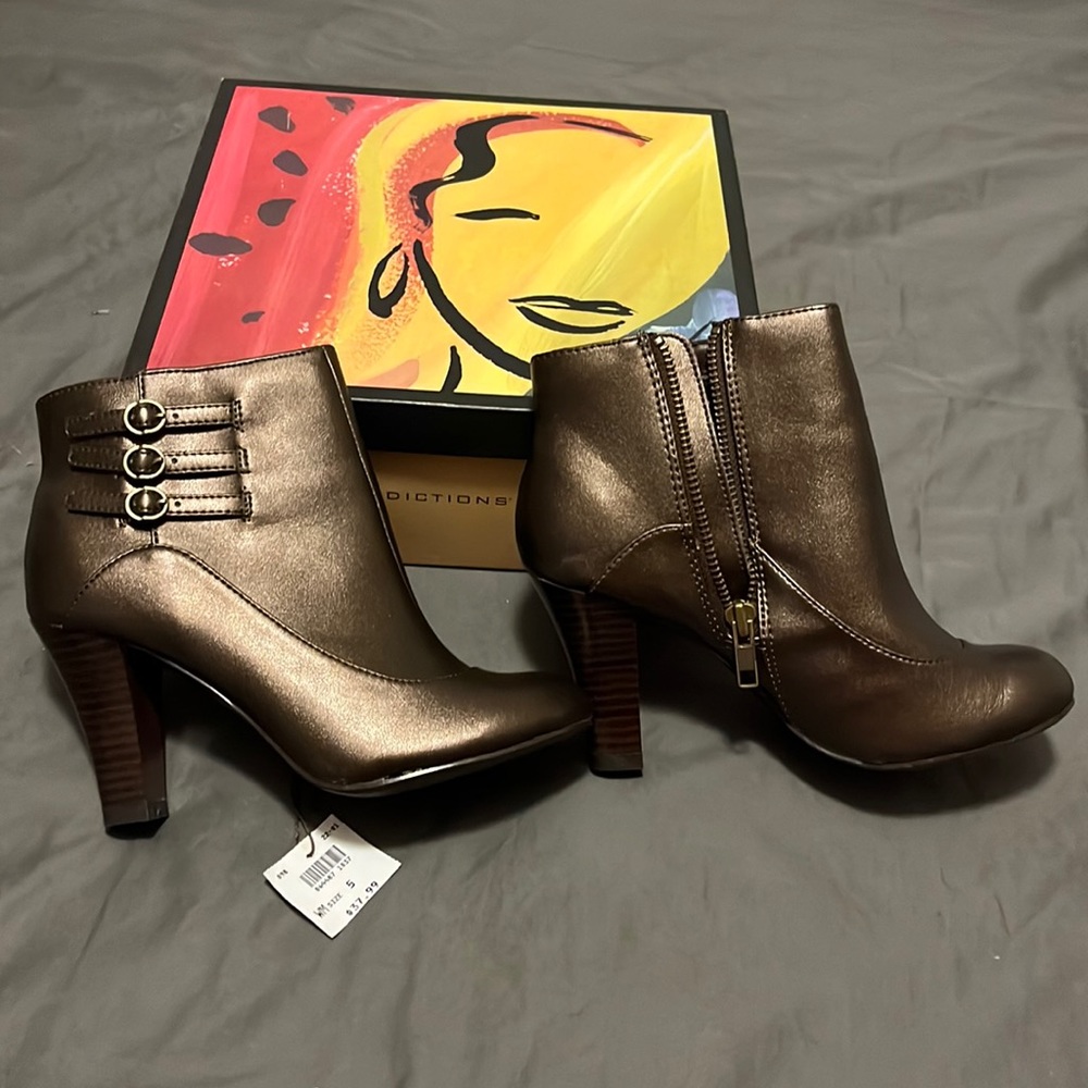 Half -boots that zip and have 2.5” heel.